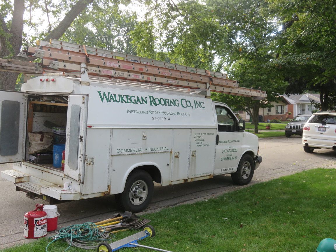 Waukegan Roofing employees donated their time to install the new roof for the WRC Gives Back recipients.